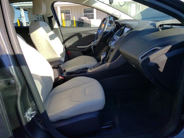 2015 FORD FOCUS TITA 1FADP3J24FL286009