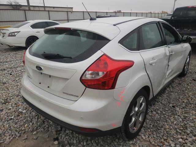 2014 FORD FOCUS TITA 1FADP3N25EL317051