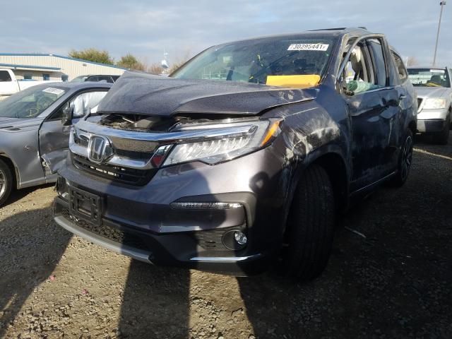 2020 HONDA PILOT TOUR - 5FNYF5H90LB000216