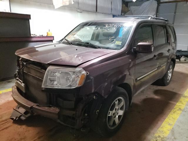 2011 HONDA PILOT TOUR 5FNYF4H95BB022026