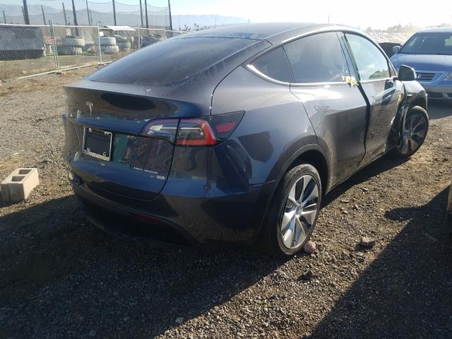 2021 TESLA MODEL Y 5YJYGDEE7MF063372