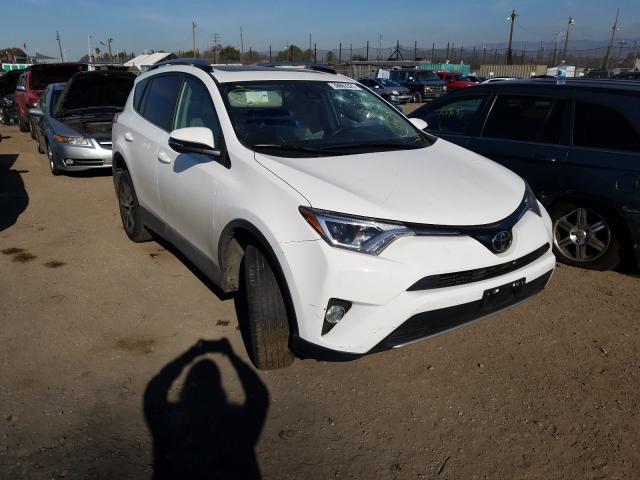 2017 TOYOTA RAV4 XLE - JTMWFREV4HJ101386
