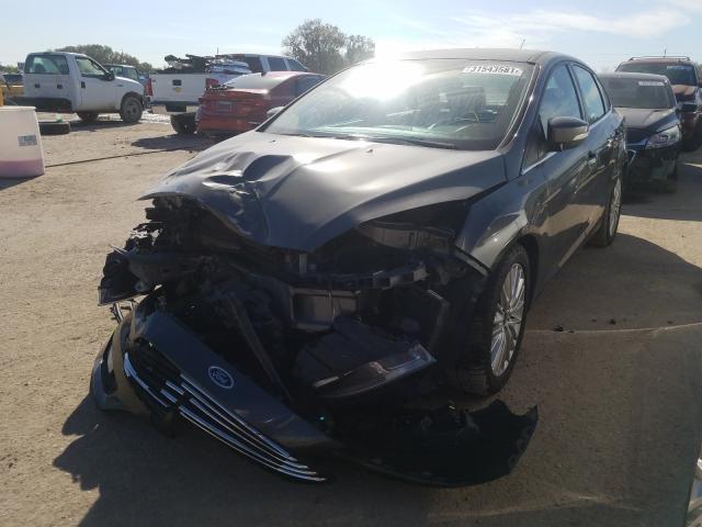 2016 FORD FOCUS TITA 1FADP3J23GL371845