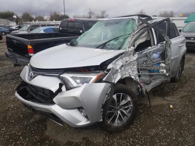 2016 TOYOTA RAV4 HV XL - JTMRJREVXGD048024