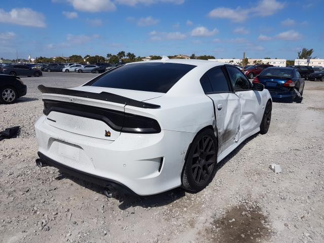 Фото: 2C3CDXGJ7JH289338 - 4