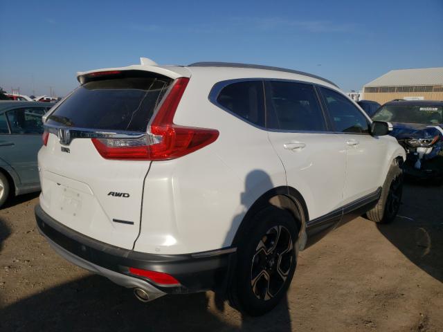 2019 HONDA CR-V TOURI JHLRW2H99KX021964