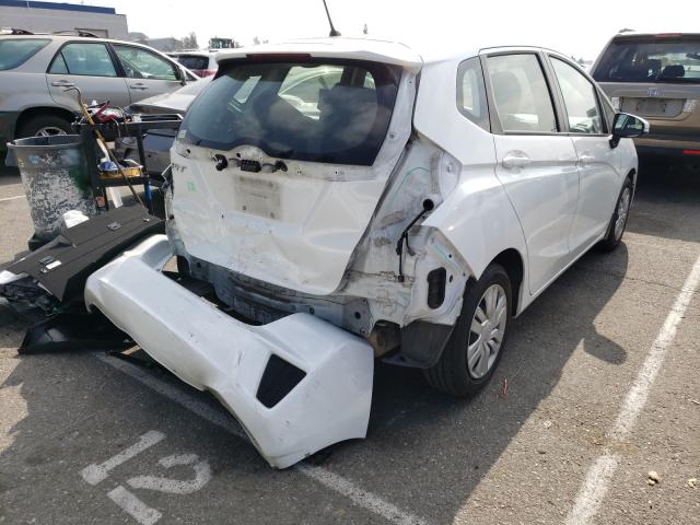 2016 HONDA FIT LX JHMGK5H59GS008360
