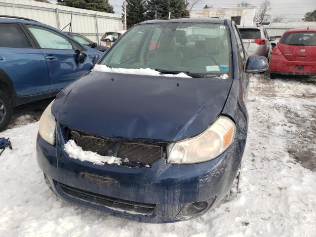 2011 SUZUKI SX4 LE JS2YC5A2XB6300352