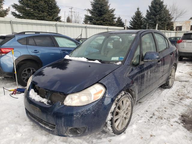 2011 SUZUKI SX4 LE JS2YC5A2XB6300352