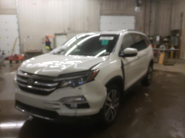 2018 HONDA PILOT ELIT 5FNYF6H03JB002143