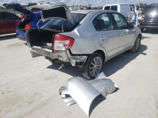 2011 SUZUKI SX4 LE JS2YC5A22B6300720