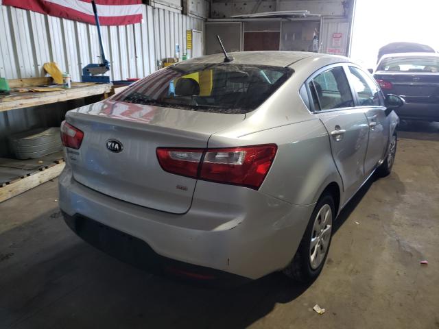 KNADM4A3XE6414135 KIA RIO LX