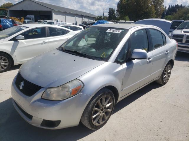 2011 SUZUKI SX4 LE JS2YC5A22B6300720