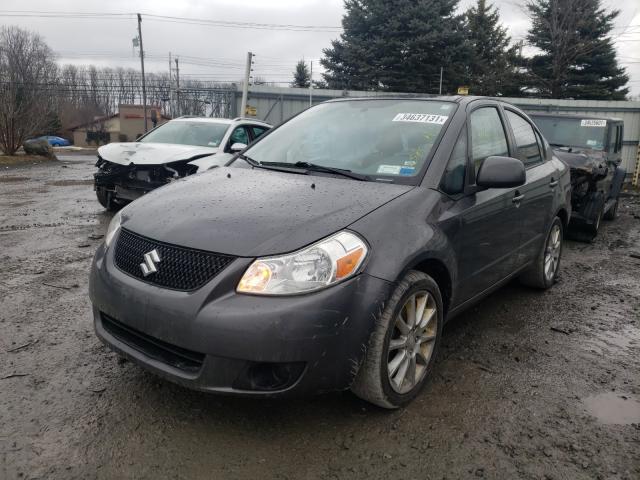 2011 SUZUKI SX4 LE JS2YC5A28B6304576