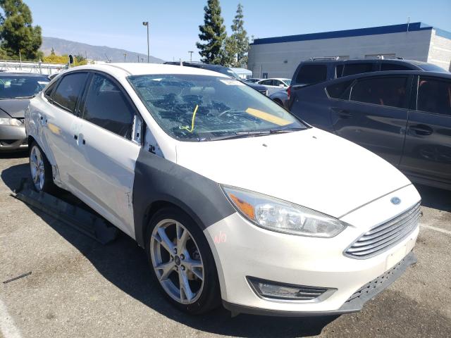 2015 FORD FOCUS TITA 1FADP3J21FL231887