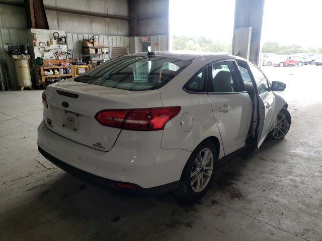 2015 FORD FOCUS SE 1FADP3F22FL259688