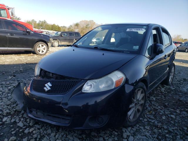 2011 SUZUKI SX4 LE JS2YC5A23B6303707