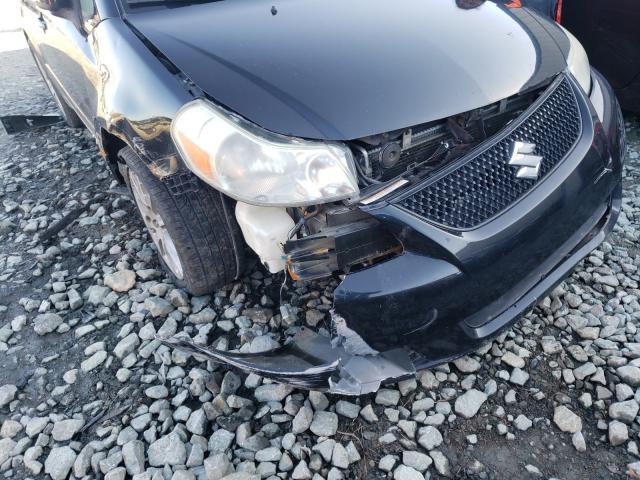 2011 SUZUKI SX4 LE JS2YC5A23B6303707