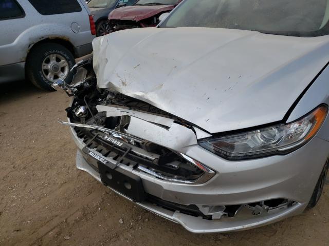 VIN 5TDBZRBH8MS113574 2021 Toyota Highlander, LE no.9