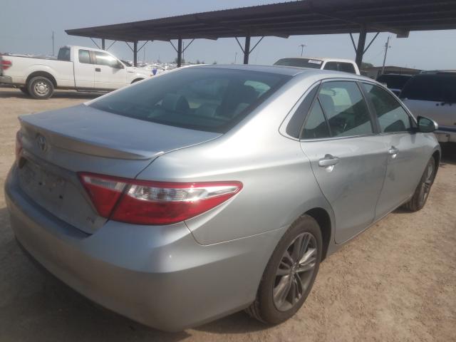 VIN JN1CV6AP9DM713025 2016 TOYOTA CAMRY LE no.4