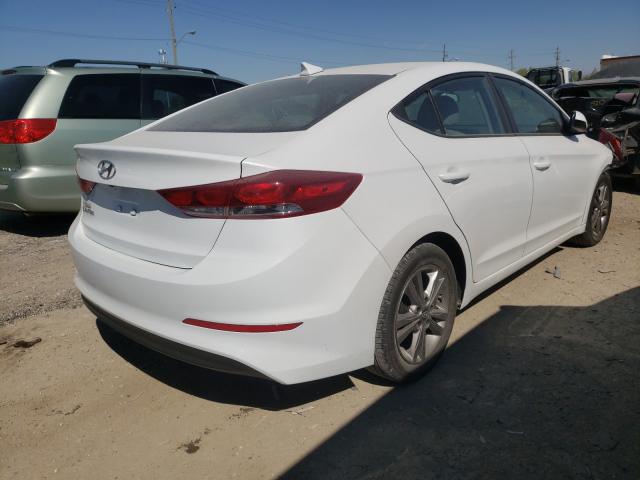 VIN 3FA6P0HD8KR239415 2019 Ford Fusion, SE no.4