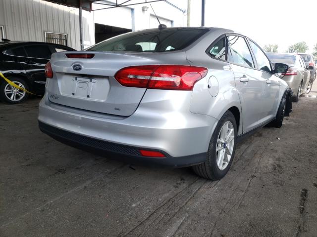 VIN 3FTTW8A31RRA34593 2015 FORD FOCUS SE no.4