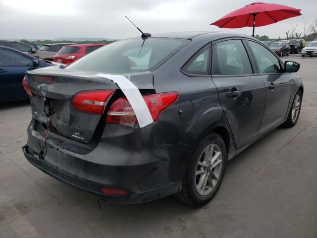 VIN 3VWF17AT9FM646049 2016 FORD FOCUS SE no.4