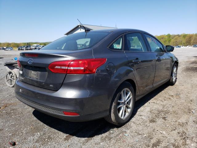 VIN 1C4NJRBB0ED595454 2015 FORD FOCUS SE no.4