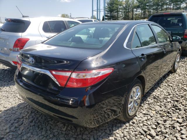 VIN 5UXFG2C55E0H10058 2015 TOYOTA CAMRY HYBR no.4