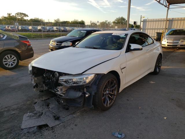 2015 BMW M4 WBS3R9C5XFK332595