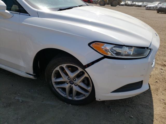 VIN 5NPDH4AE4DH276945 2014 FORD FUSION SE no.9