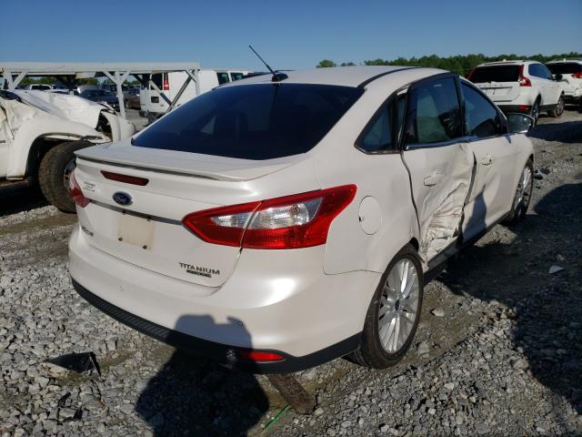 2014 FORD FOCUS TITA 1FADP3J21EL190062