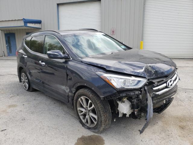 2014 HYUNDAI SANTA FE S 5XYZUDLA2EG128572