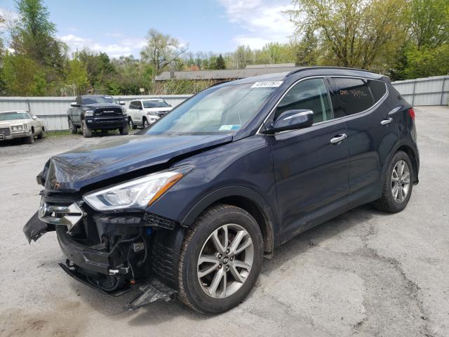 2014 HYUNDAI SANTA FE S 5XYZUDLA2EG128572
