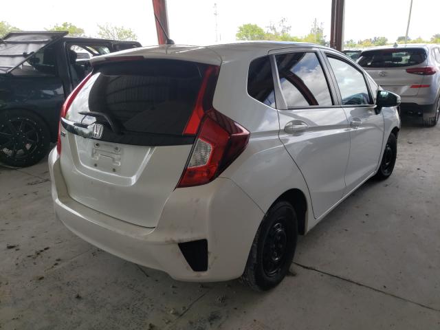 2016 HONDA FIT LX JHMGK5H54GX011881