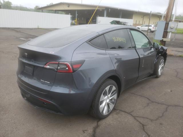 2021 TESLA MODEL Y 5YJYGDEE0MF144634