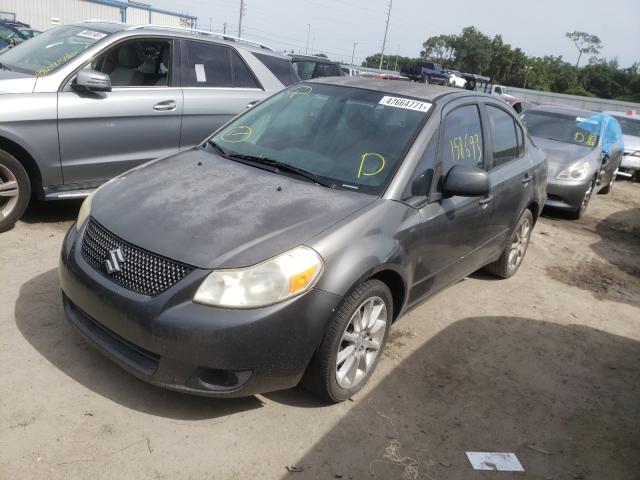 2011 SUZUKI SX4 LE JS2YC5A20B6303888