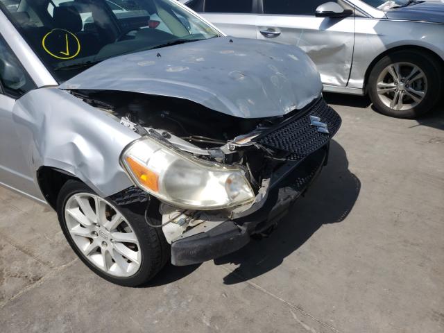 2011 SUZUKI SX4 LE JS2YC5A26B6300378