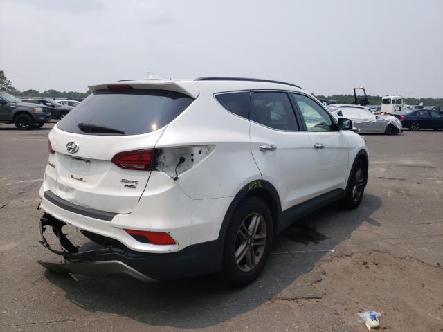2017 HYUNDAI SANTA FE 5NMZUDLB7HH012206