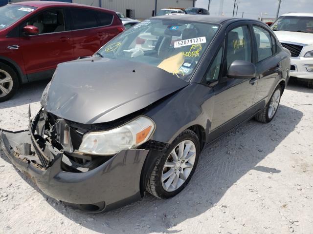 2011 SUZUKI SX4 LE JS2YC5A21B6300885