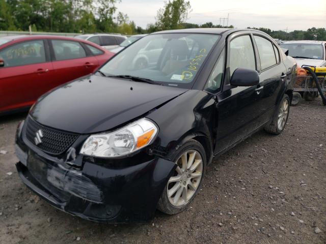 2011 SUZUKI SX4 LE JS2YC5A24B6304087