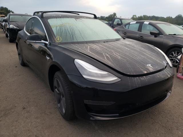 2019 Tesla Model 3  (VIN: 5YJ3E1EBXKF361285)