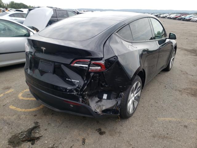 2021 TESLA MODEL Y 5YJYGAEEXMF199347
