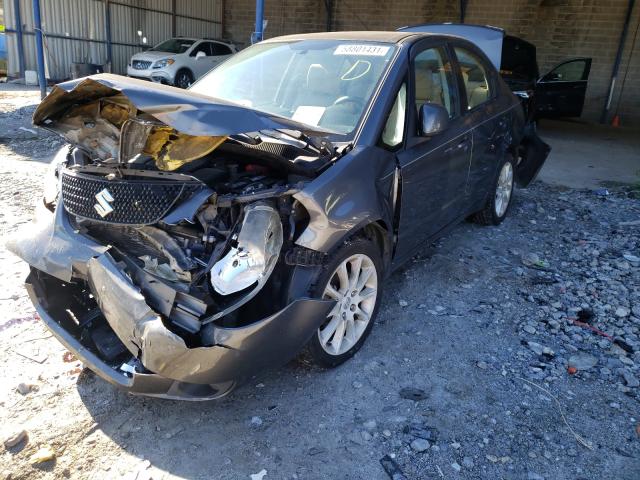 2011 SUZUKI SX4 LE JS2YC5A27B6303189