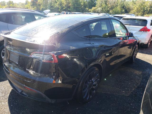 2021 TESLA MODEL Y 5YJYGDEF9MF246197