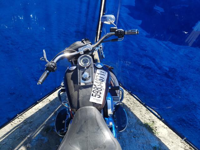 2011 HARLEY-DAVIDSON FLSTN 1HD1JD519BB021154