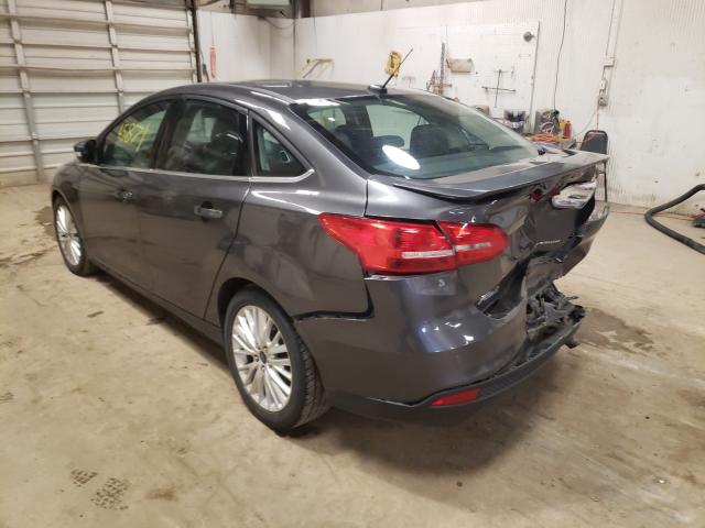 2015 FORD FOCUS TITA 1FADP3J28FL375341