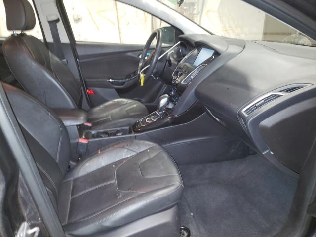 2015 FORD FOCUS TITA 1FADP3J28FL375341