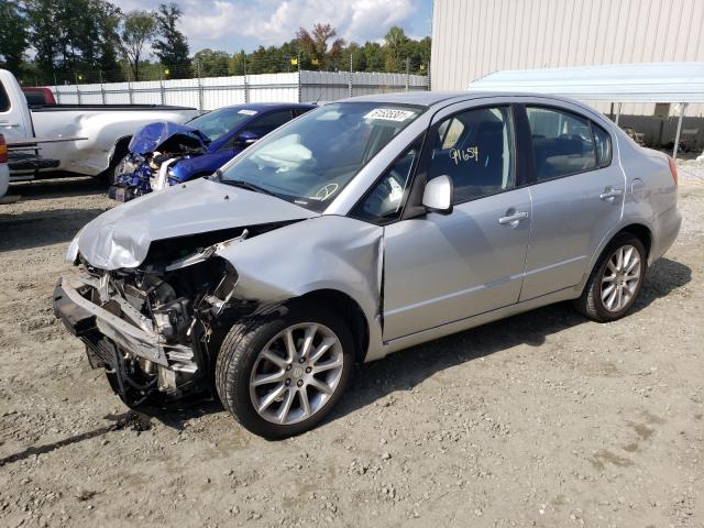 2011 SUZUKI SX4 LE JS2YC5A27B6303693