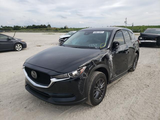 2021 Mazda Cx-5 Sport VIN: JM3KFABM9M0360135 Lot: 63611541